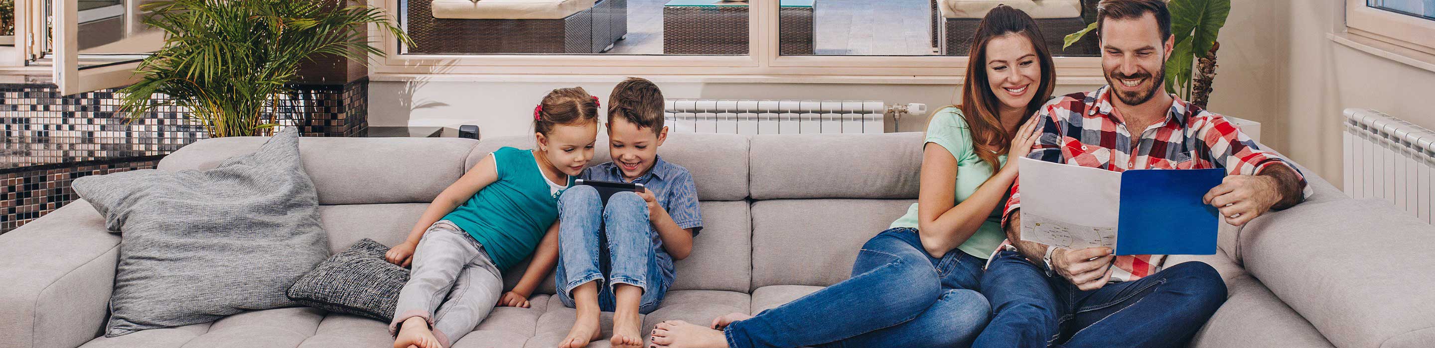 UES-Residential-rebates Family on couch together